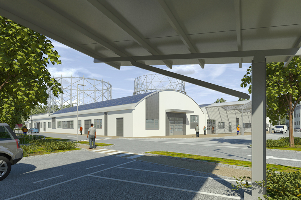 Centro di Ricerca Italgas con persone e auto, edifici moderni, alberi e cielo sereno.